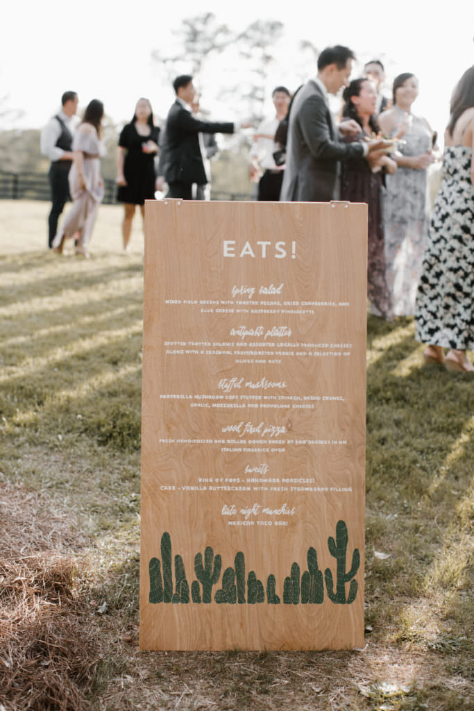 Wedding reception signage listing menu items