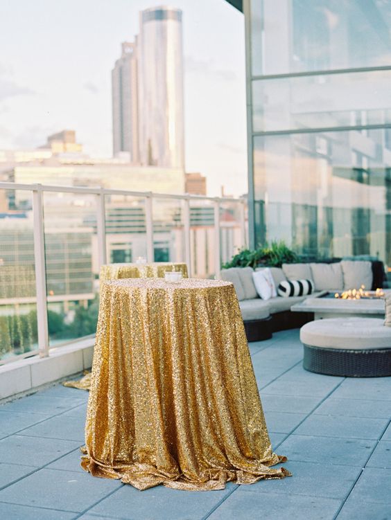 Table draped in glittery table cloth