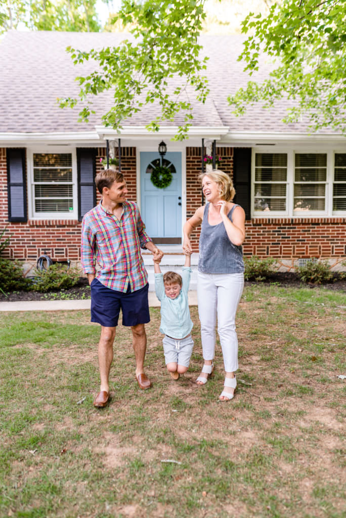 Family, Chris and Sarah Chancey with Boaz outside their Atlanta Home