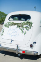 Wedding car with greenery and lettering saying forever & always, luxury wedding exit ideas